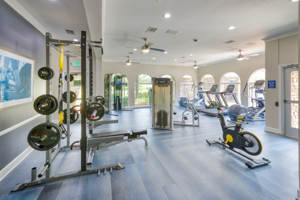 Fitness center with plenty of free weights at Gateway Park Apartments in Denver, Colorado
