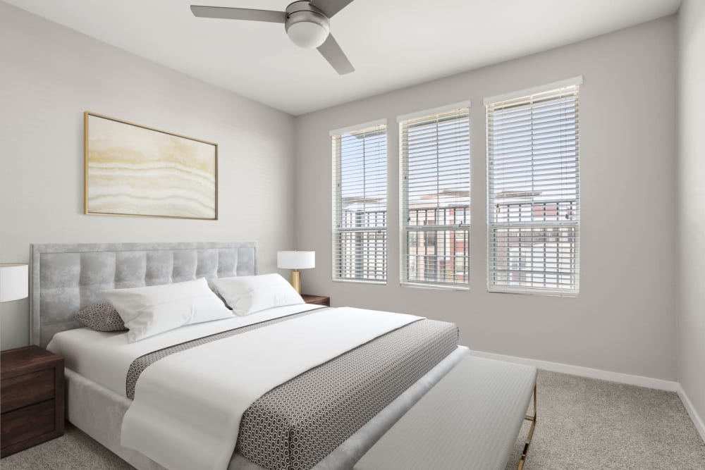 Model bedroom with plush carpeting at Town Commons in Gilbert, Arizona