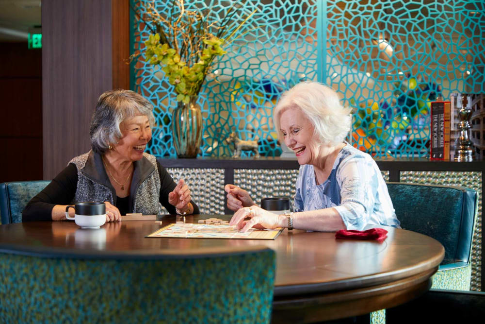 Residents at restaurant together at Murano in Seattle, Washington