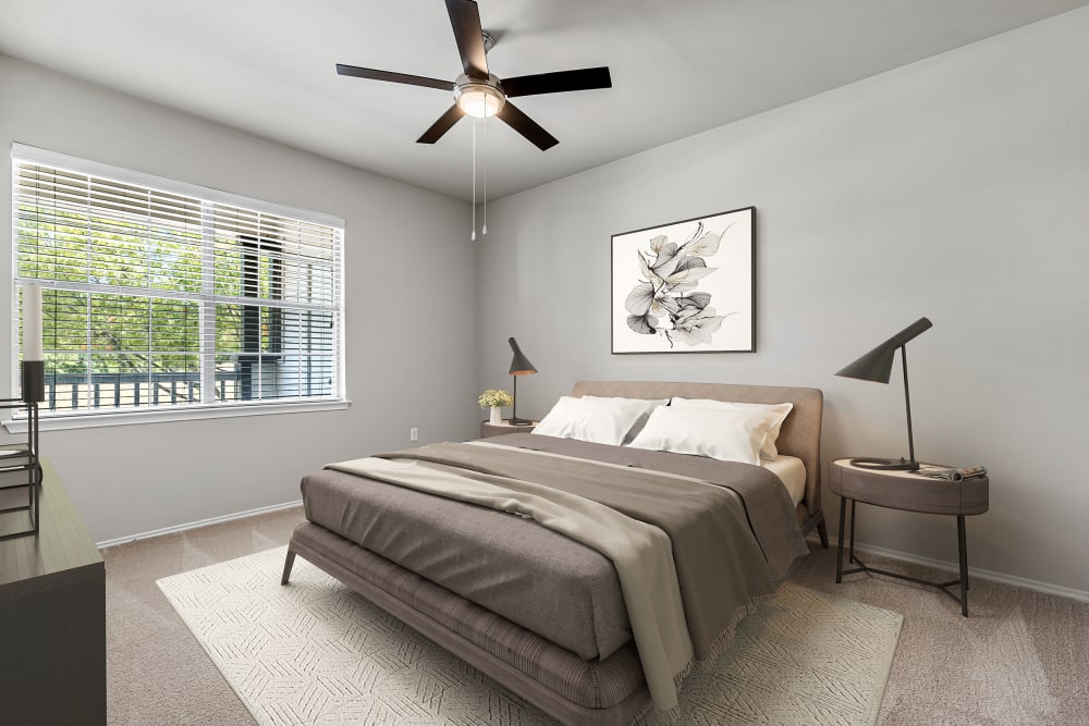 Bedroom with carpet and ceiling fan at Marquis at Stonebriar in Frisco, Texas