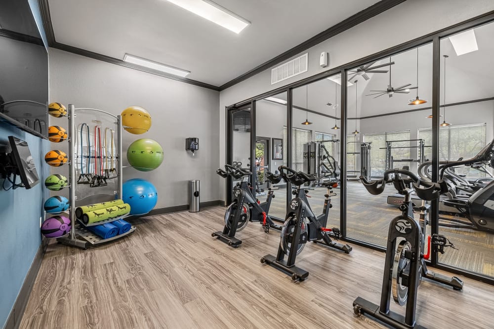 Fitness center with spin room at Marquis at Stonebriar in Frisco, Texas