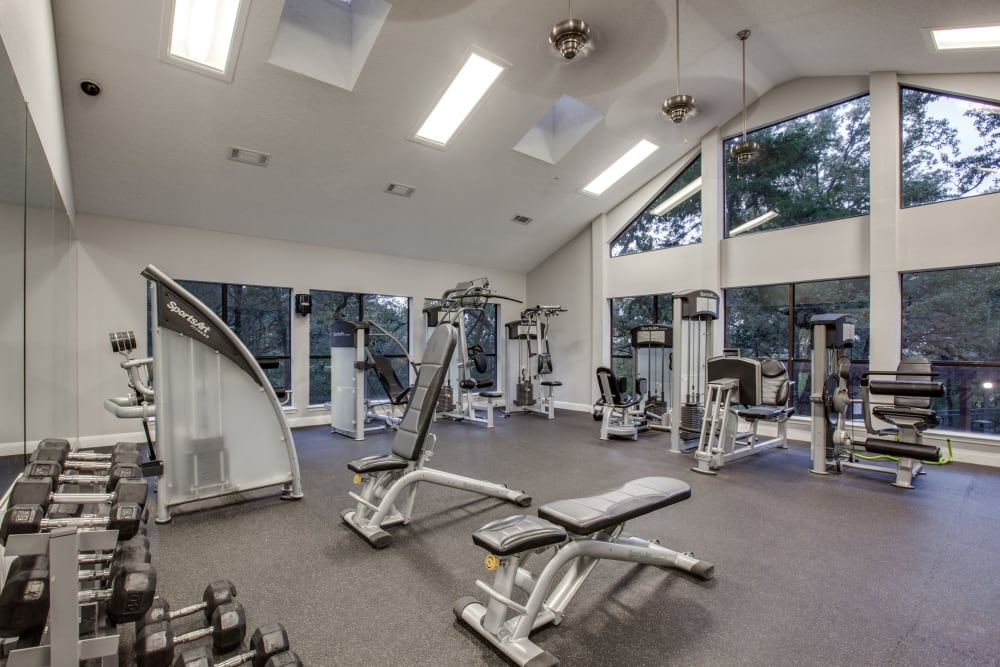 Exercise equipment in the fitness center at Verandahs at Cliffside Apartments in Arlington, Texas