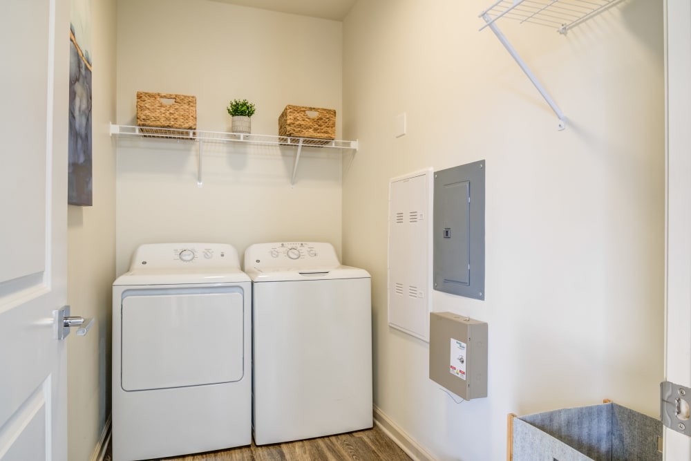 A full sized dryer in an apartment laundry room at Brookside Heights Apartments in Cumming, Georgia