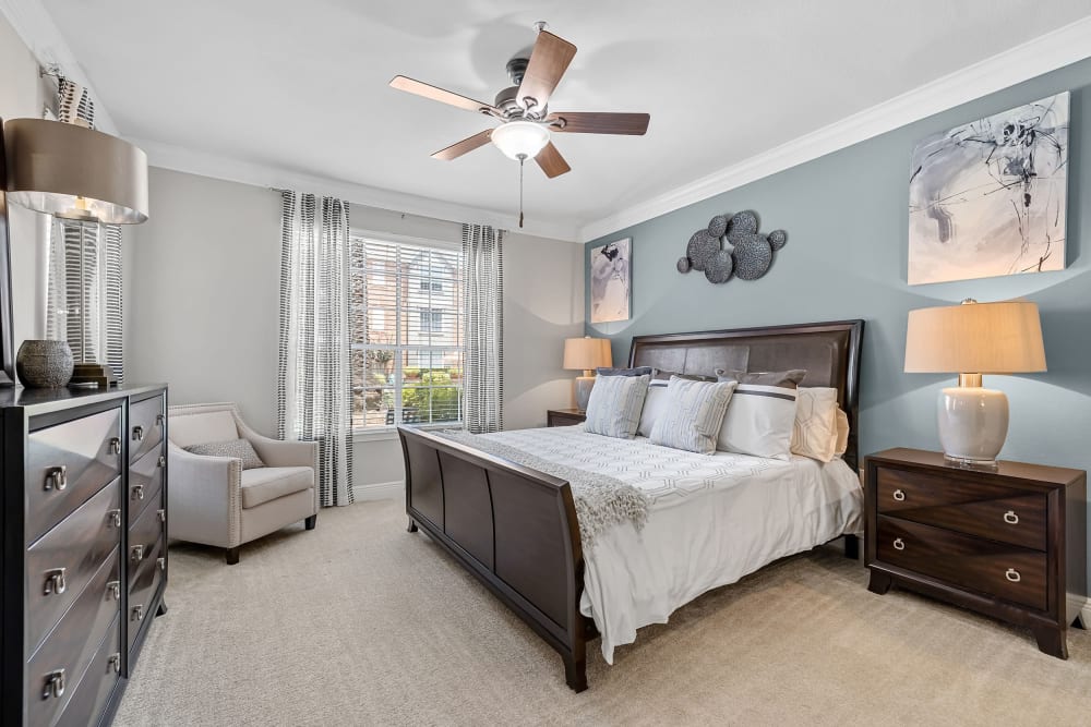 Spacious bedroom with carpet floors at Marquis on Pin Oak in Houston, Texas