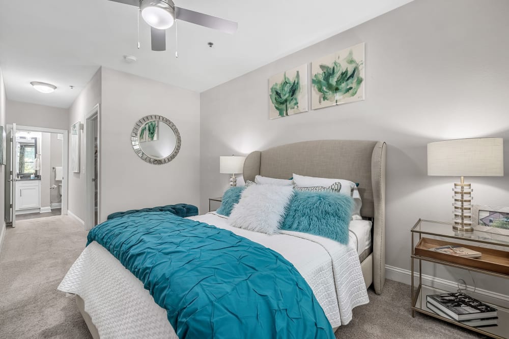 Bright bedroom with a ceiling fan at Marq Perimeter in Atlanta, Georgia