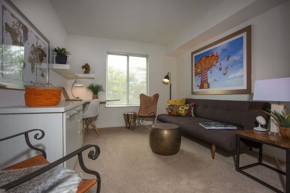 Comfy living room at Briar Cove Terrace Apartments in Ann Arbor, Michigan