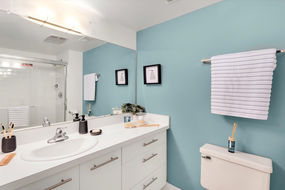 Bathroom with an oversized vanity with ample storage at Fairmont Park Apartments in Farmington Hills, Michigan