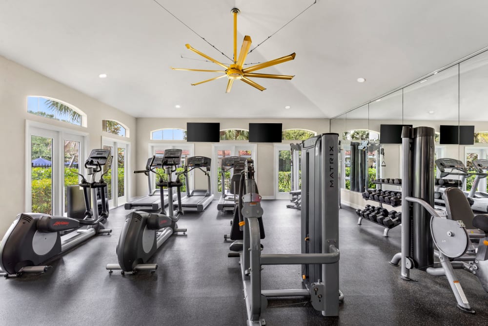 Resident gym with lots of equipment at Harbortown Apartments in Orlando, Florida