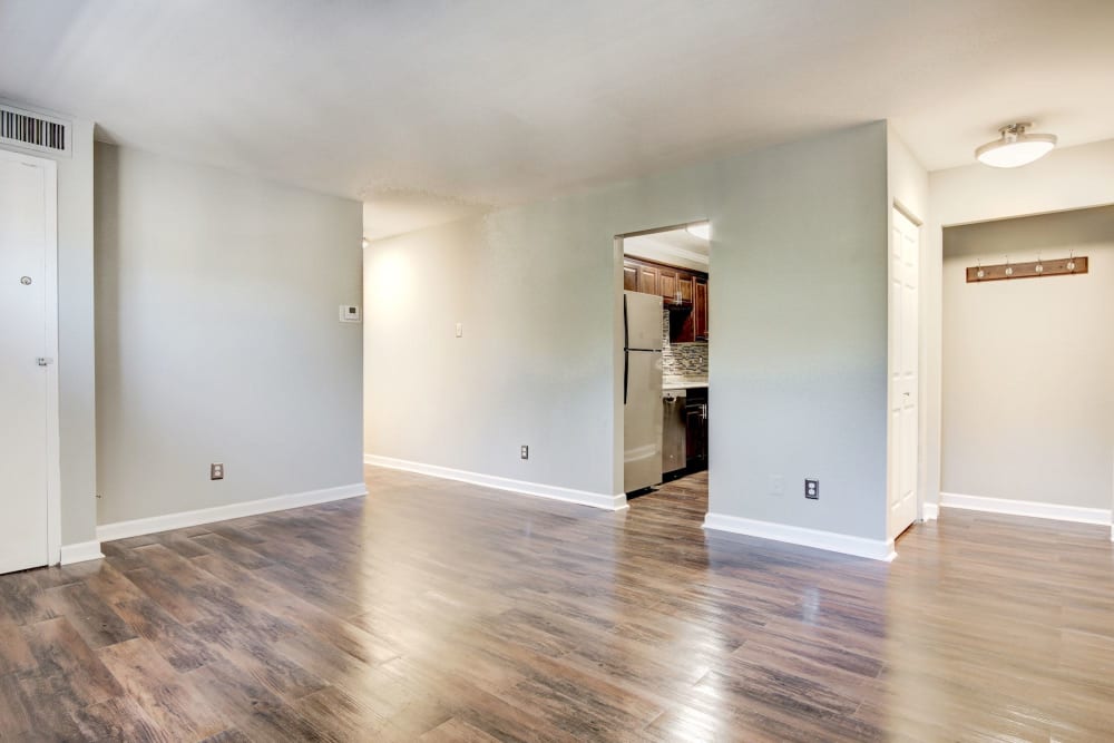 Open-concept layout with hardwood floors in a model home at Heritage at Shaw Station in Washington, District of Columbia