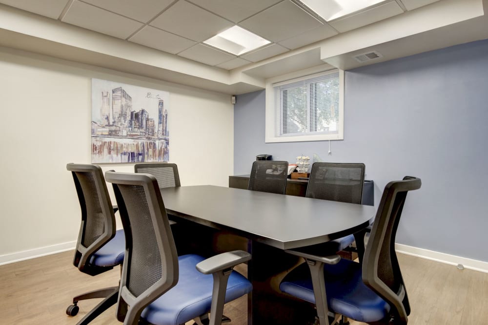 Meeting room in the business center for resident use at Heritage at Shaw Station in Washington, District of Columbia