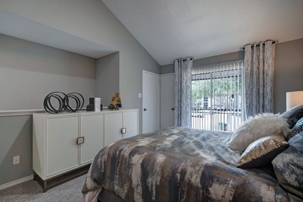 Cozy bedroom at Apartments in Sugar Land, Texas