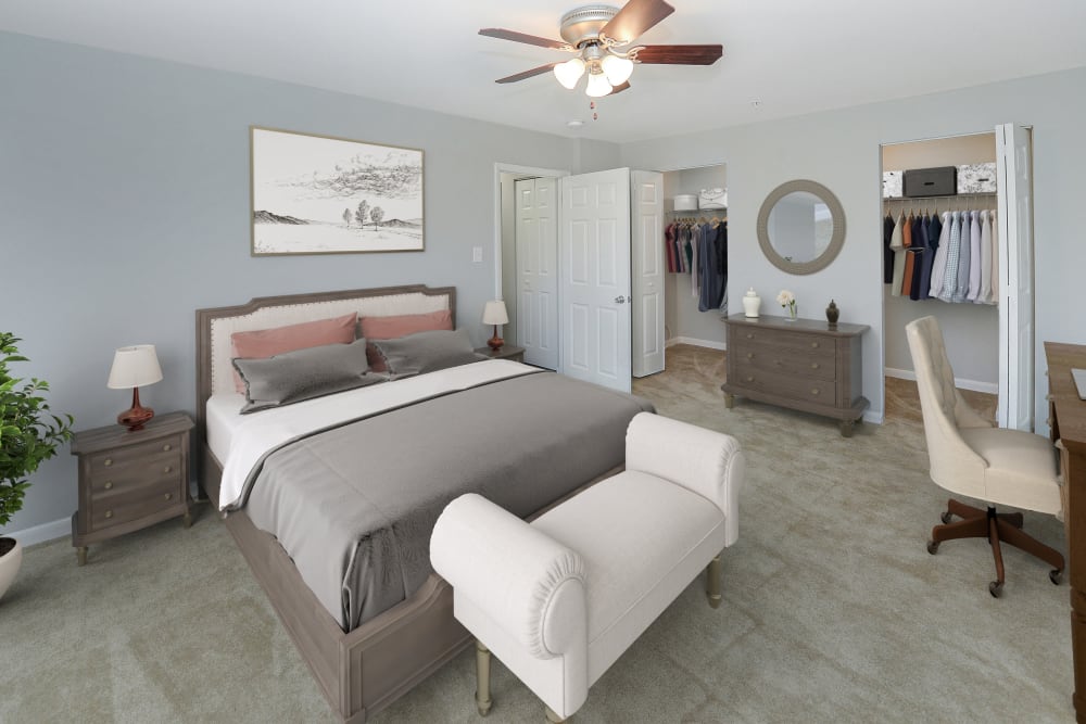 Staged bedroom with 2 closets at Woodacres Apartment Homes in Claymont, DE