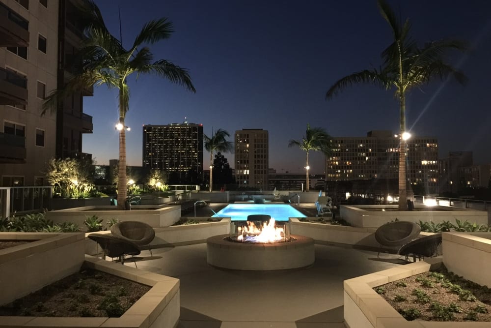 Fire pit outside at night at 255 Grand in Los Angeles, California