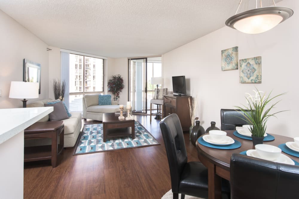 Living and dining room at Promenade Towers in Los Angeles, California