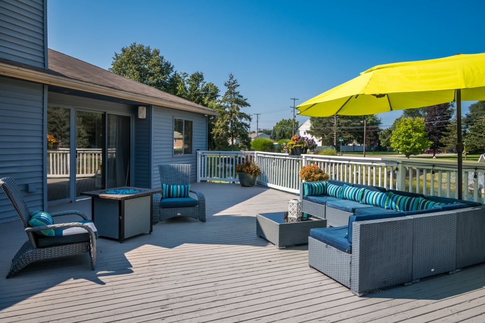 Paver patio with outdoor sitting area at Waters Edge Apartments in Lansing, Michigan