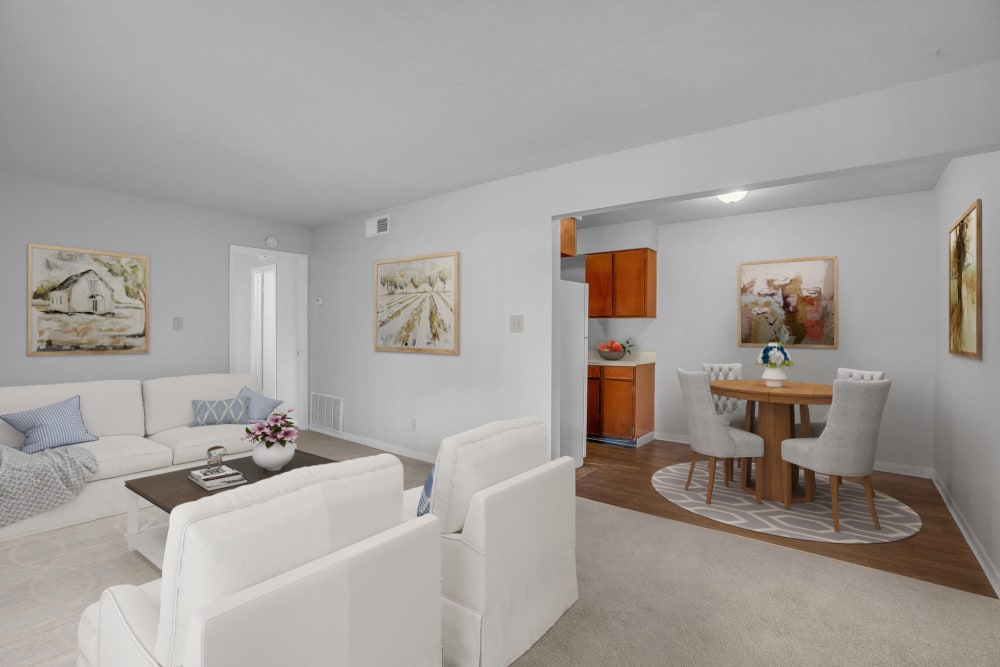 An apartment dining room and living room at Palmetto Circle in North Augusta, South Carolina