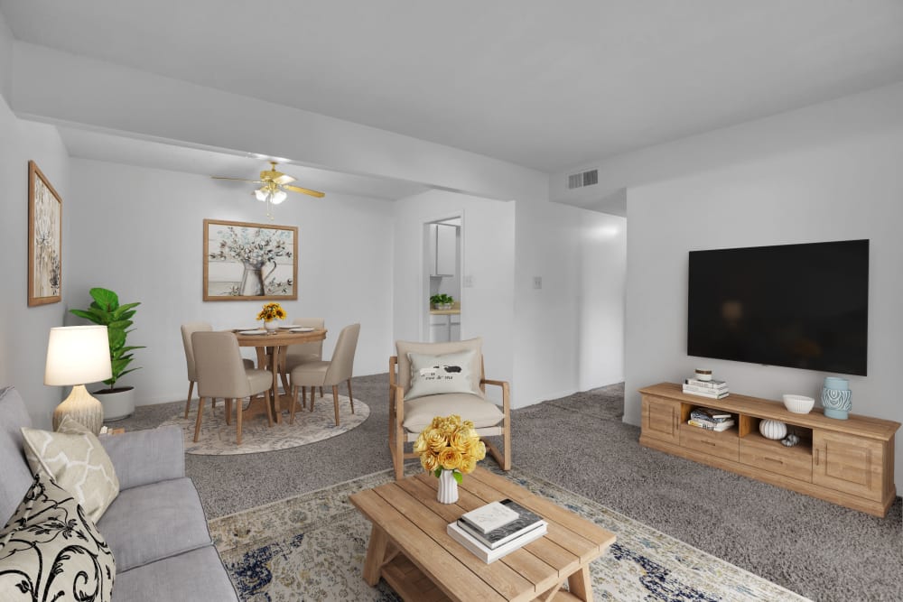A spacious apartment living room and dining room in the background at Palmetto Circle in North Augusta, South Carolina