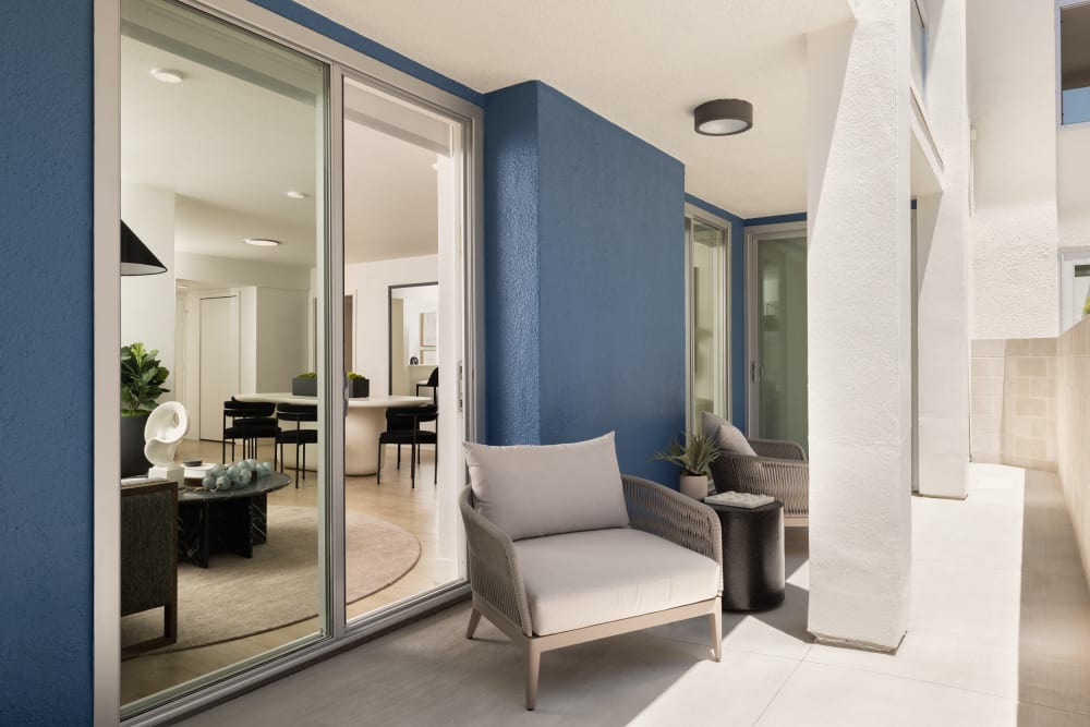 Patio area with lounge chair at Dolphin Marina Apartments in Marina Del Rey, California