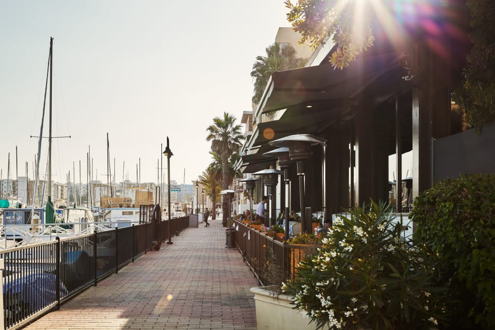 A walkway next to the marina at Dolphin Marina Apartments in Marina Del Rey, California