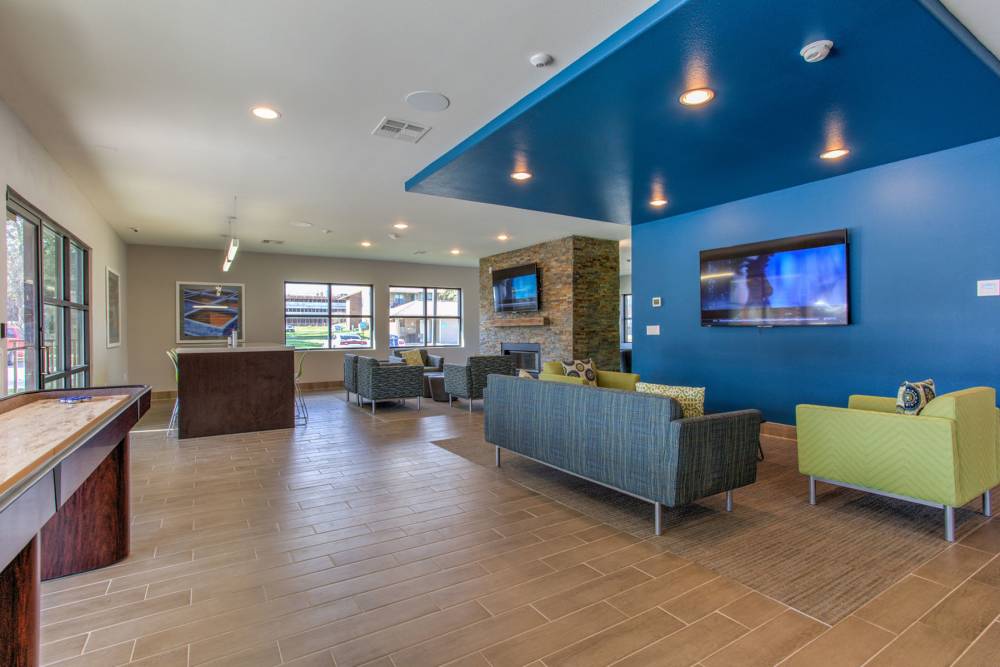 Recreation room with lounge and games at The Landing at College Station in College Station, Texas