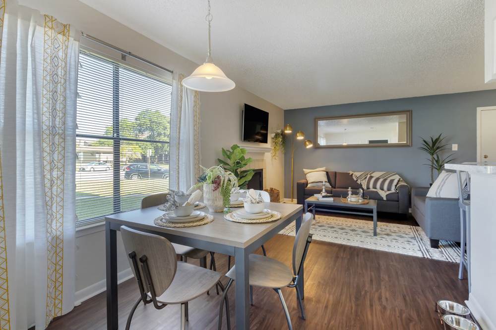 Apartment dining area near the living room at The Landing at College Station in College Station, Texas