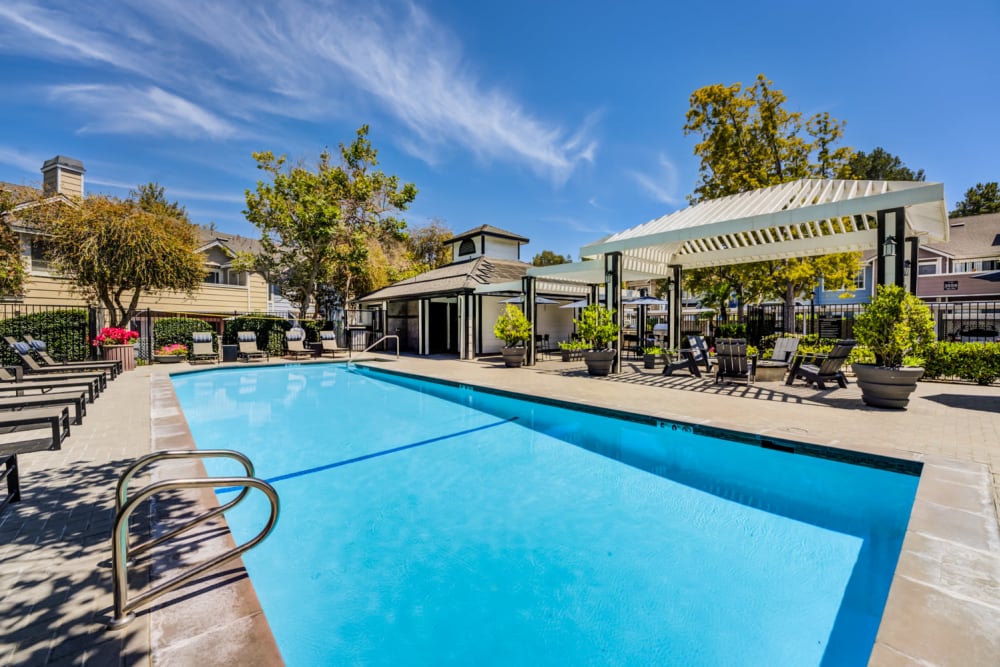 Swimming Pool with Benches at Sofi Ocean Hills in Oceanside, California