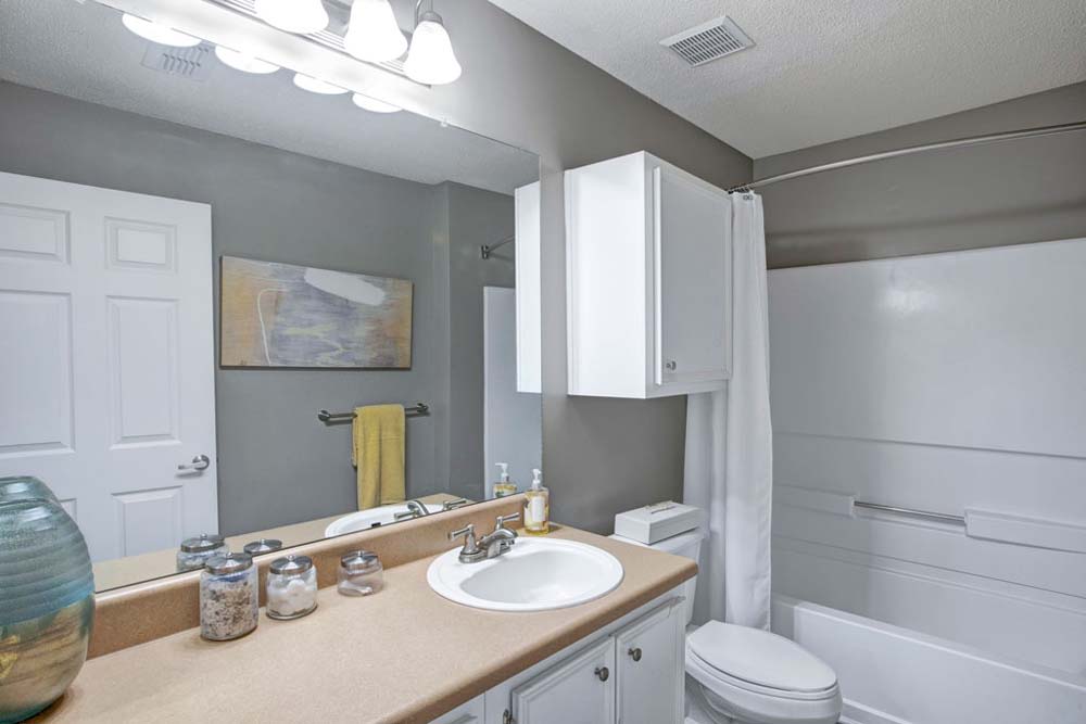 Bathroom with tub at Apartments in Jonesboro, Georgia