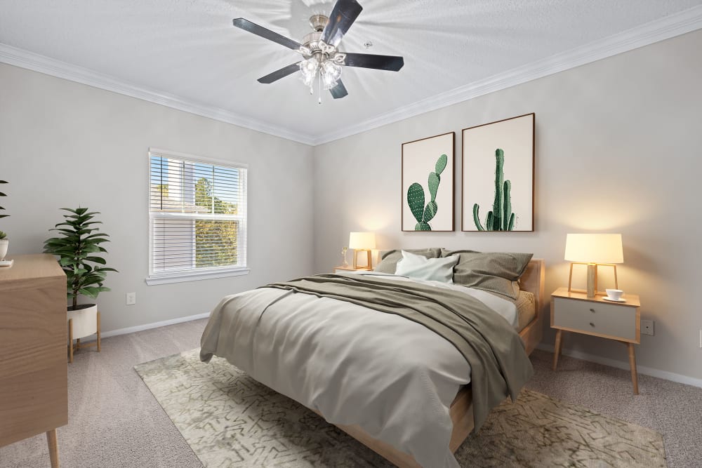 Large bedroom with window and ceiling fan at Marquis at Silverton in Cary, North Carolina