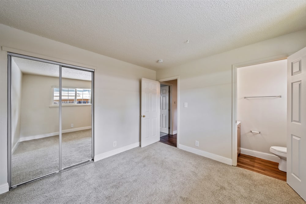 Bedroom with attached bathroom at Mountain View Apartments in Concord, California