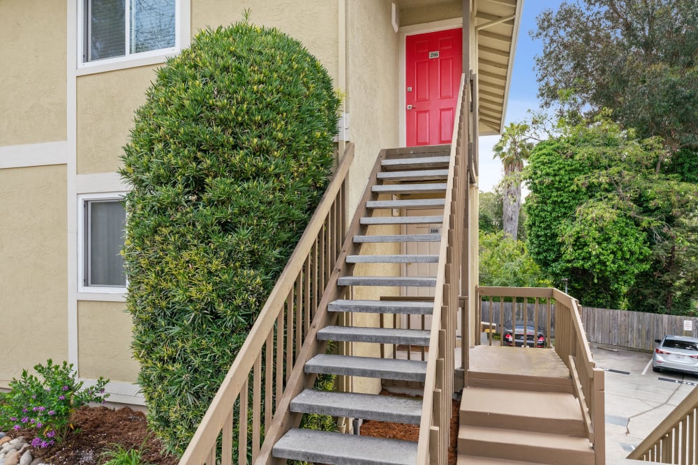 Stairs to a private apartment entrance at Vista Creek Apartments in Castro Valley, California