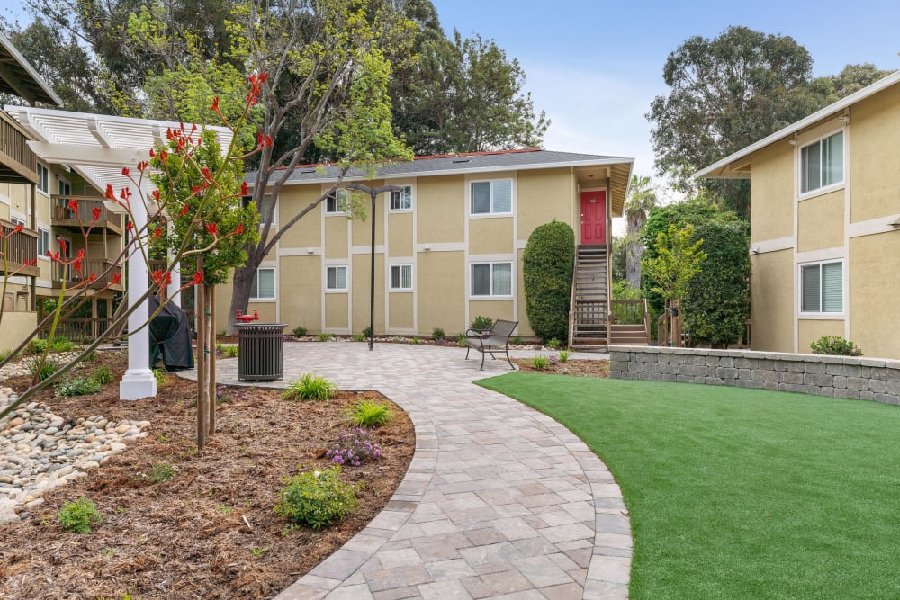 Courtyard and stone walkway at Vista Creek Apartments in Castro Valley, California