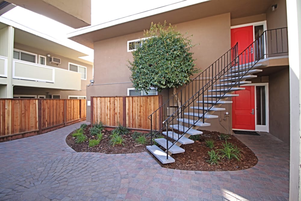 Stairs leading up to an apartment at Coronado Apartments in Fremont, California