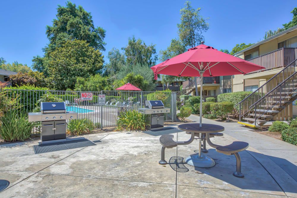 Patio tables and grills at Almaden 1930 in San Jose, California