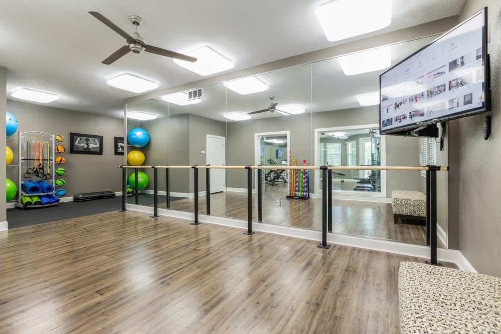 Community fitness center at Art Avenue Apartment Homes in Orlando, Florida