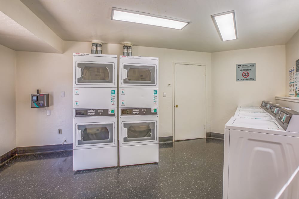 Laundry room at Cherry Creek Apartments in San Jose, California