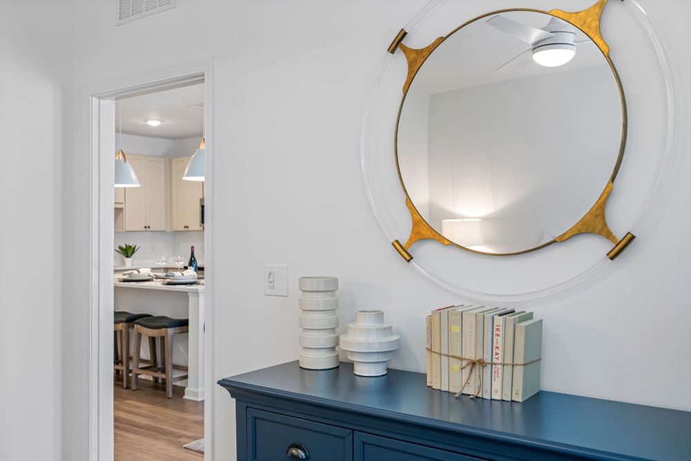 Entrance hallway with a dresser and mirror at Primrose at Santa Rosa Beach in Santa Rosa Beach, Florida