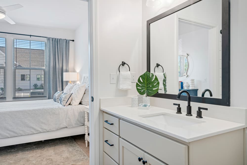 Sink in an attached bathroom to the bedroom at Primrose at Santa Rosa Beach in Santa Rosa Beach, Florida