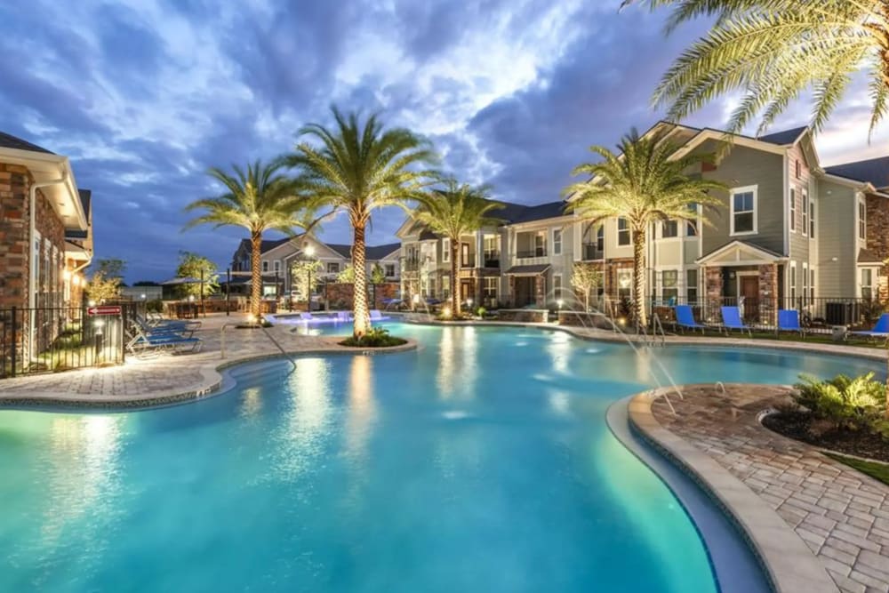 Resort-style swimming pool at Verso Luxury Apartments in Davenport, Florida