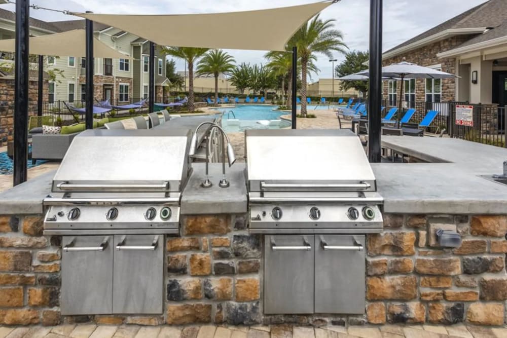 Outdoor grills at Verso Luxury Apartments in Davenport, Florida