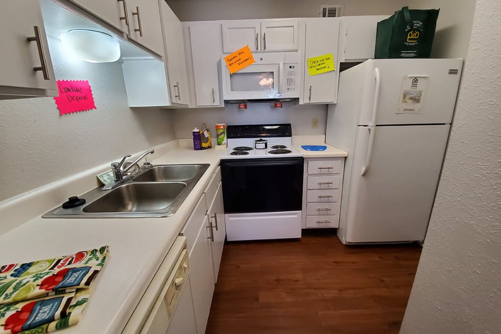 Apartment kitchen with white finishes at Briar Glen in Oklahoma City, Oklahoma