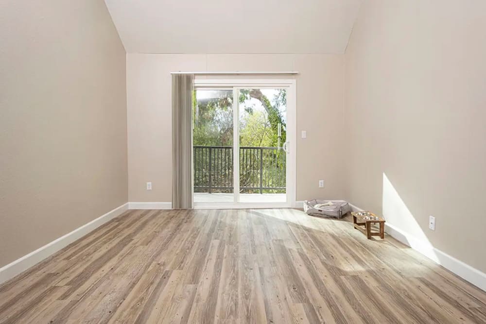 Wood-style flooring in an apartment at Americana Apartments in Rohnert Park, California