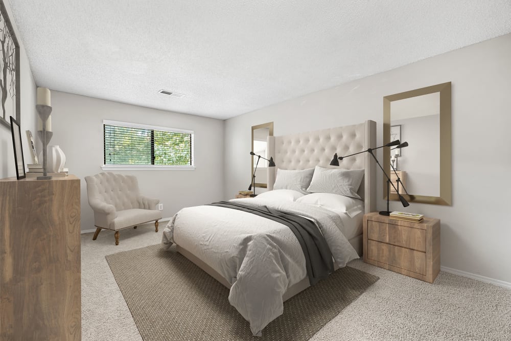 Bedroom with carpeted floors at Marquis at Perimeter Center in Atlanta, Georgia