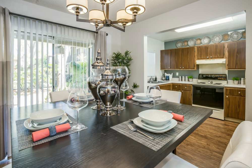 Open concept floor plan with dining area and kitchen at Briarcrest at Winter Haven in Winter Haven, Florida