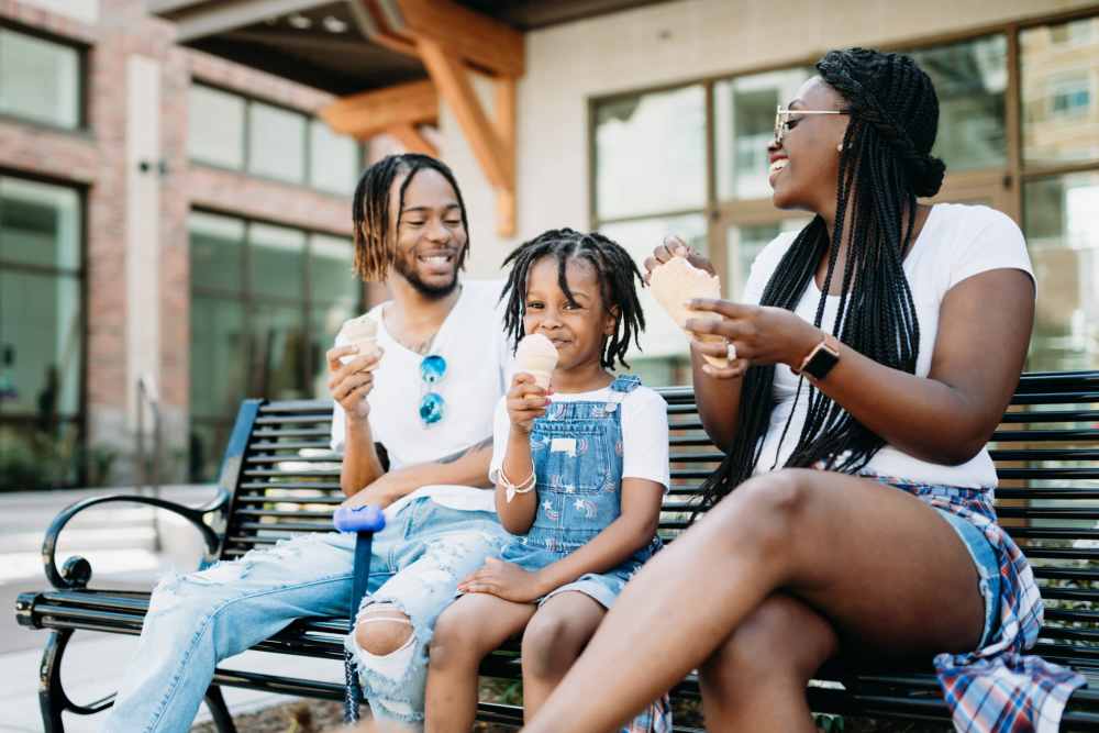Family enjoying ice cream out near Coopers Pond in Tampa, Florida