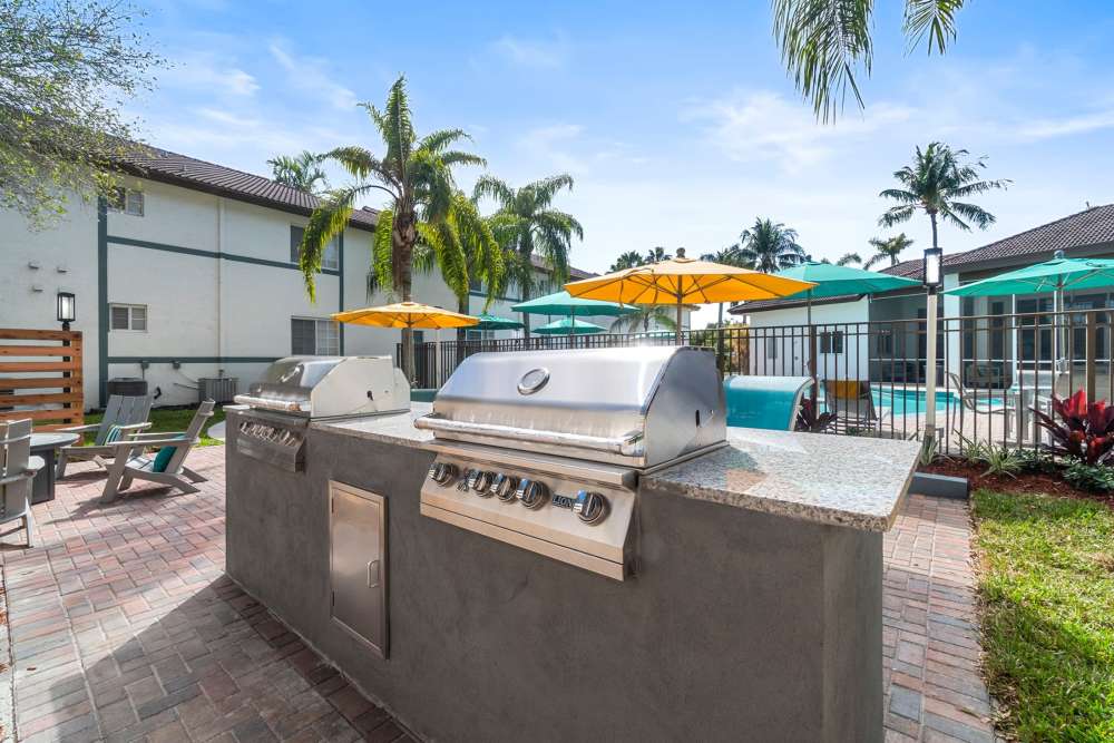 Outdoor grilling station at Nova Central Apartments in Davie, Florida