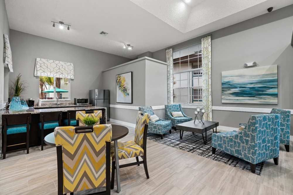 Trendy community clubhouse with lounge at Nova Central Apartments in Davie, Florida