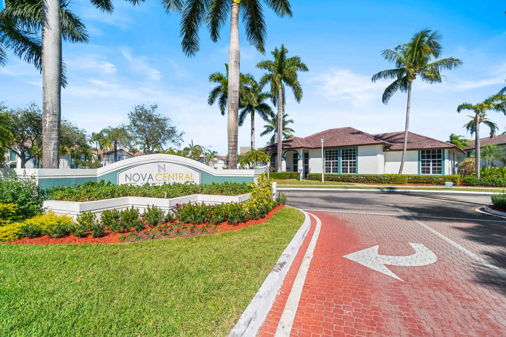 Exterior and main entrance at Nova Central Apartments in Davie, Florida
