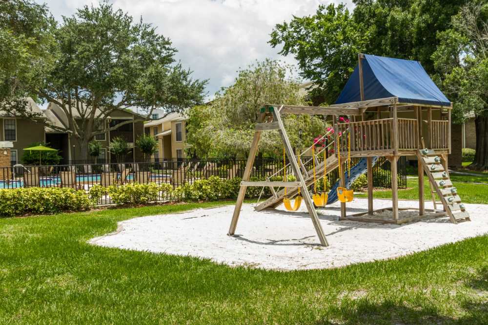 Children's playground outdoors at Legend Oaks in Tampa, Florida