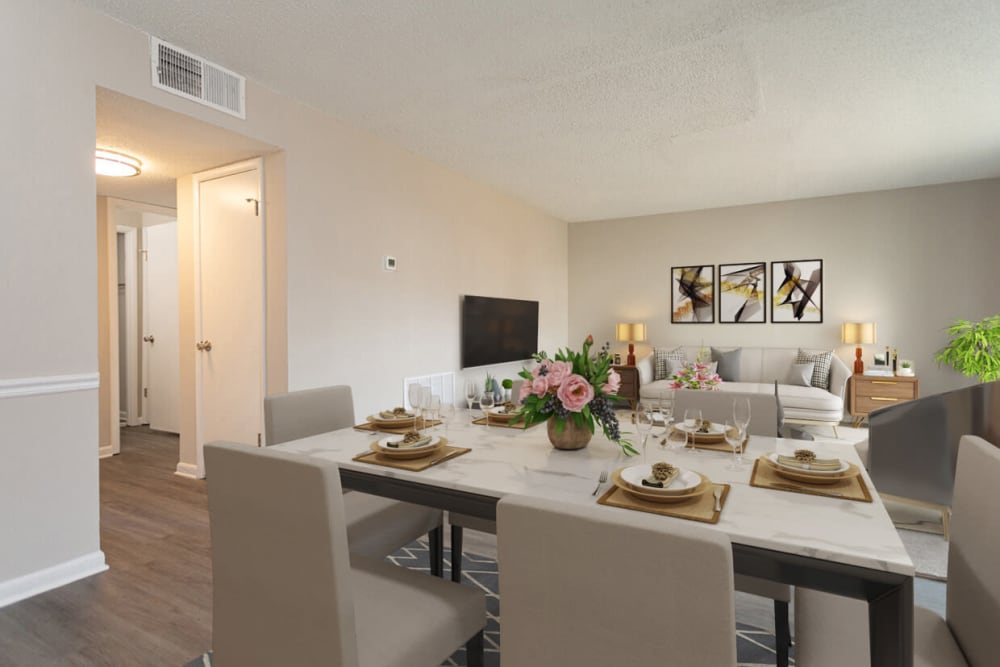 A set dining room table in an apartment at Cambridge Place Apartments in Montgomery, Alabama