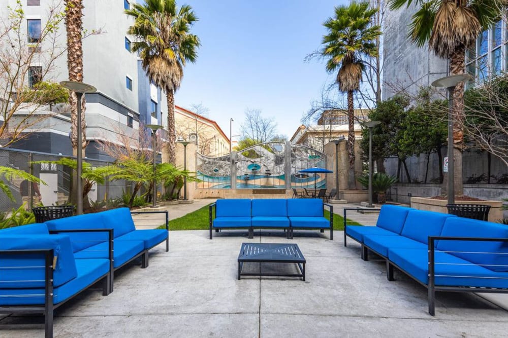 Outdoor courtyard lounge with a firepit at K Street Flats in Berkeley, California